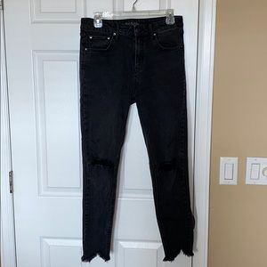 High waisted black ripped skinny jeans